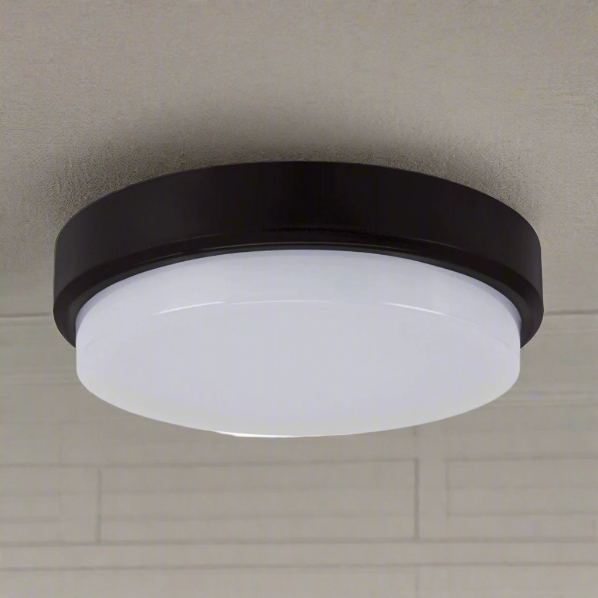 CGC KIKI Black Opal Round Outdoor Wall Or Ceiling Light Bulkhead 12WOutdoor wall sconces with motion sensor